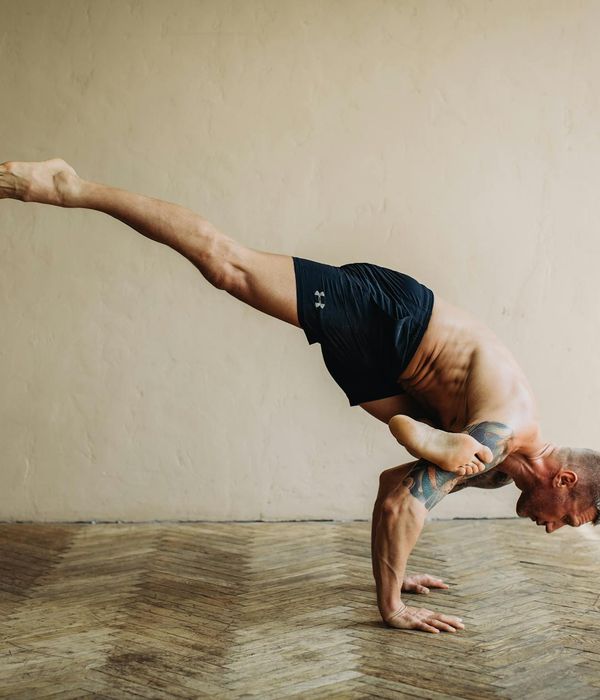 Man in a powerful and controlled athletic pose.